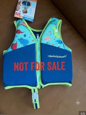 SwimSchool Level 2 Swim Trainer Vest MD/LG 4-6 years, colorful dinosaur print.